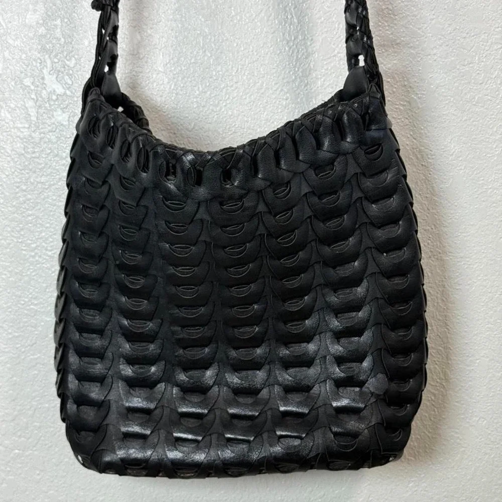 Black woven leather shoulder bag with strap